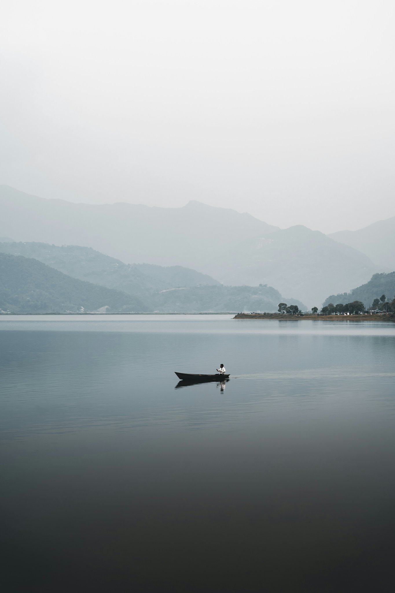 Man rowing the boat at Phewa Lake Pokhara