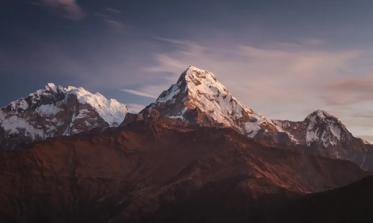 Annapurna South and Hiunchuli peaks at sunset view from Ghorepani Poon Hill trek Nepal