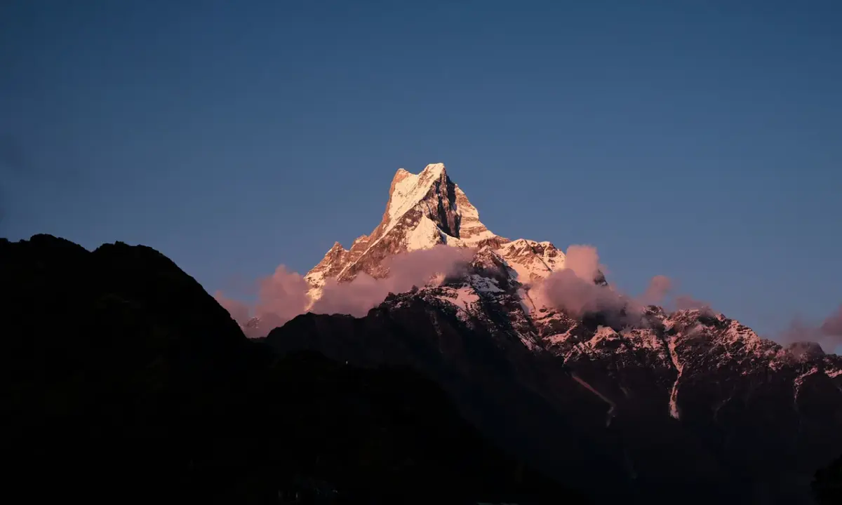 Machhapuchhre Fishtail peak glowing at sunrise during Mardi Himal Trek Annapurna Nepal