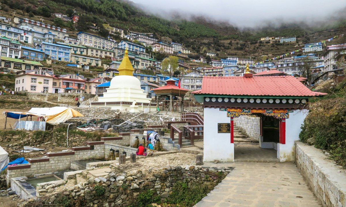 Gateway stupa and colourful buildings of Namche Bazaar, the Sherpa capital and acclimatisation stop on the Everest Base Camp Trek