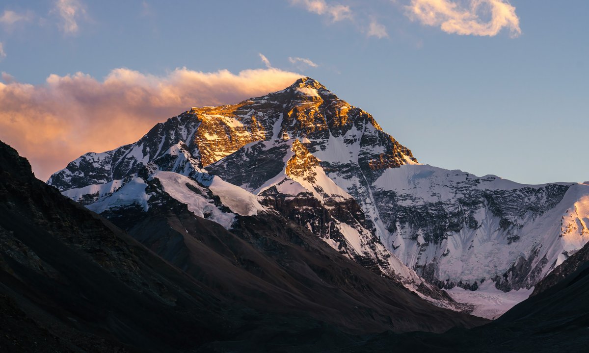Snow-covered Himalayan peak glowing at golden hour during Everest Base Camp Trek in the Khumbu region of Nepal