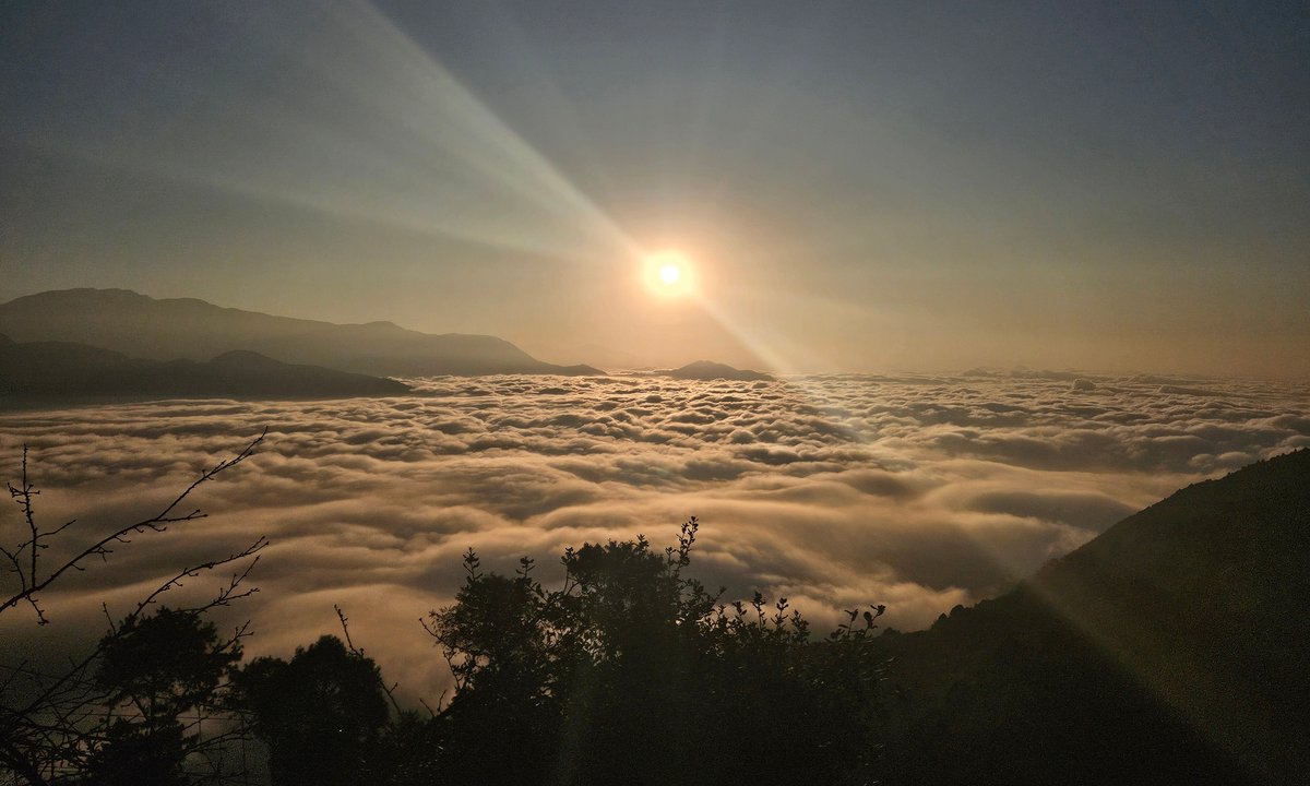 Golden sunrise above Himalayan cloud sea from Magengoat viewpoint Nepal – Ama Yangri trail running trip