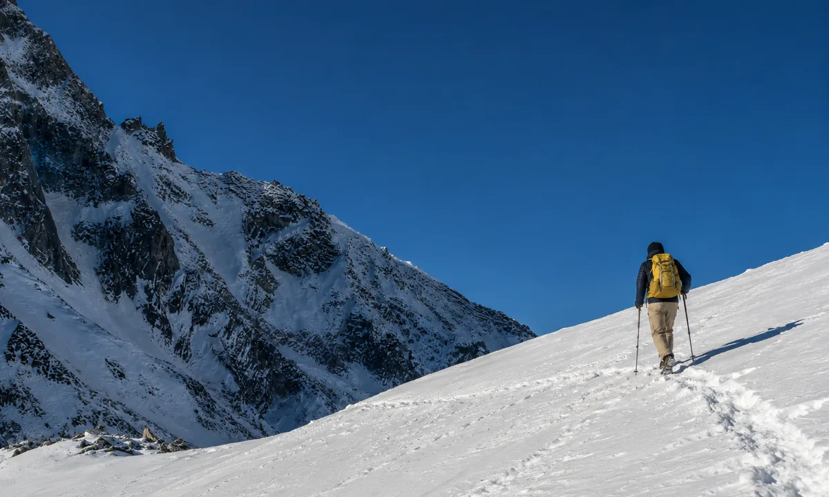 Fastpacker pushing through high-altitude snow on Manaslu Circuit, Nepal Himalayas