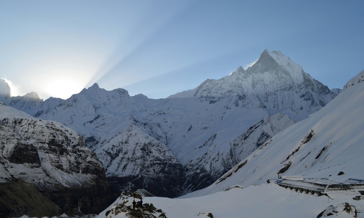 Sunburst over Machapuchare's fishtail peak on the Annapurna Base Camp trek route