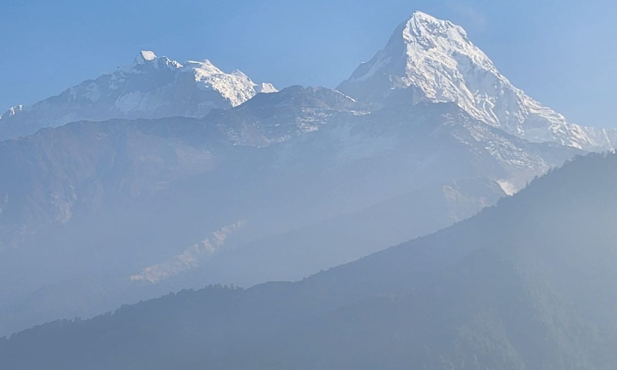 Snow-capped peak of Annapurna South or Hiuchuli from Ulleri on the Ghorepani trek route, Nepal