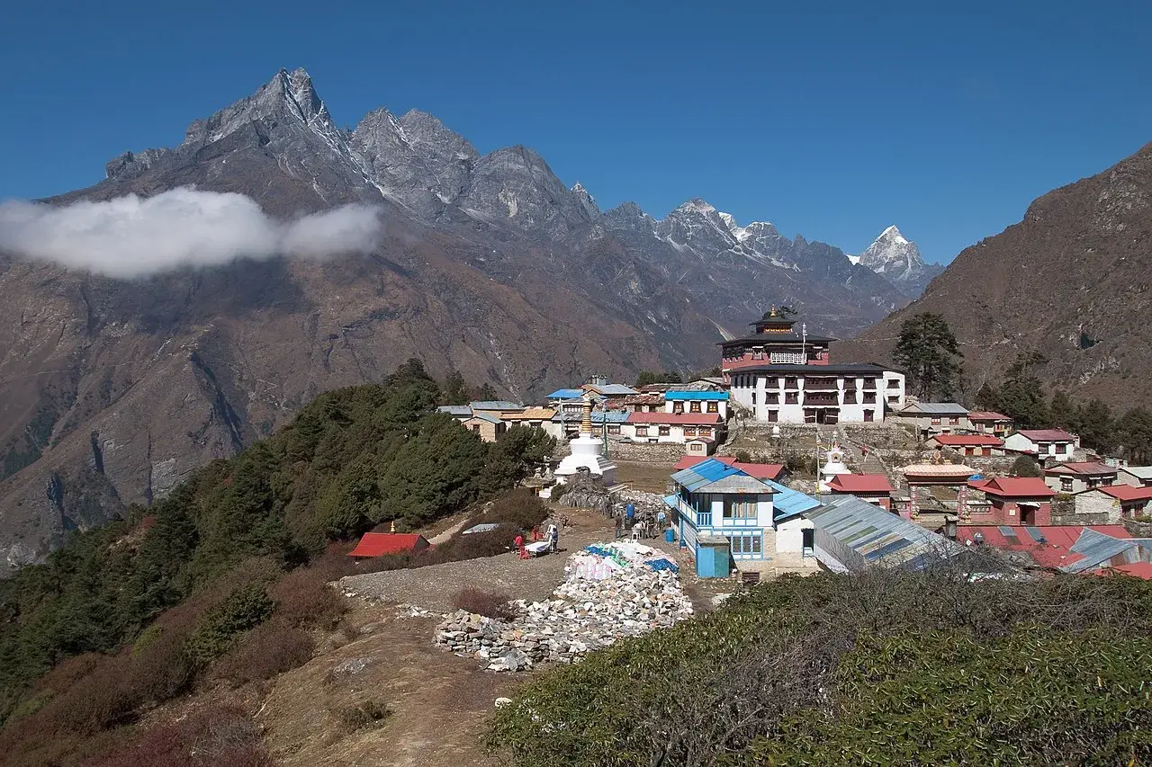 Tengboche Monastery nestled in the Himalayas, Nepal, with snow-capped peaks.