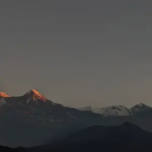 Annapurna mountain range golden hour alpenglow at sunrise Australian Camp trek Nepal