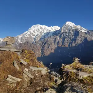 Snow-capped Annapurna range view with teahouse on Mardi Himal Trek Nepal