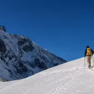 Fastpacker pushing through high-altitude snow on Manaslu Circuit, Nepal Himalayas