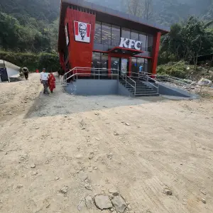 The E-Stop at Kurintar — a rest stop for EV buses on the Kathmandu–Pokhara highway. Yes, there is a KFC.