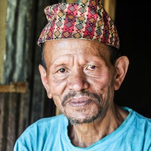 Chhetri man in traditional colourful dhaka topi, representing Nepal's largest ethnic group