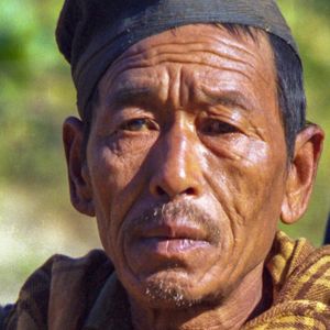 Limbu man in traditional black dhaka topi from the far-eastern hills of Nepal