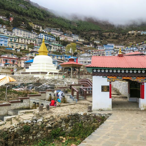 Gateway stupa and colourful buildings of Namche Bazaar, the Sherpa capital and acclimatisation stop on the Everest Base Camp Trek