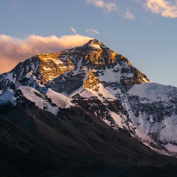 Snow-covered Himalayan peak glowing at golden hour during Everest Base Camp Trek in the Khumbu region of Nepal