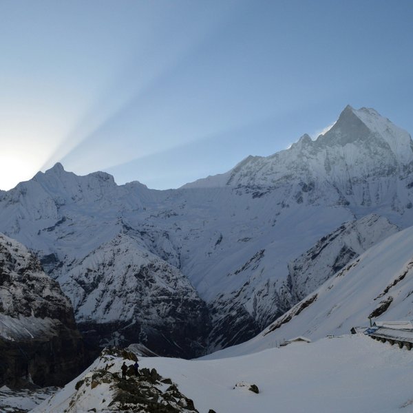 Sunburst over Machapuchare's fishtail peak on the Annapurna Base Camp trek route